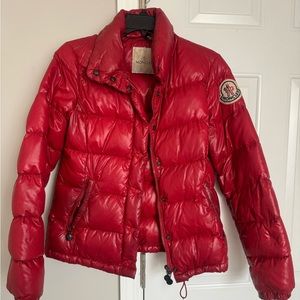 Moncler Coat size small color red with logo on sleeve. Worn often.